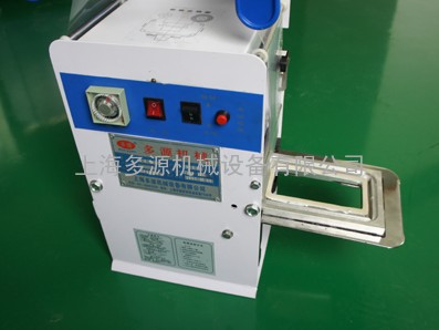 半自动豆腐盒封口机