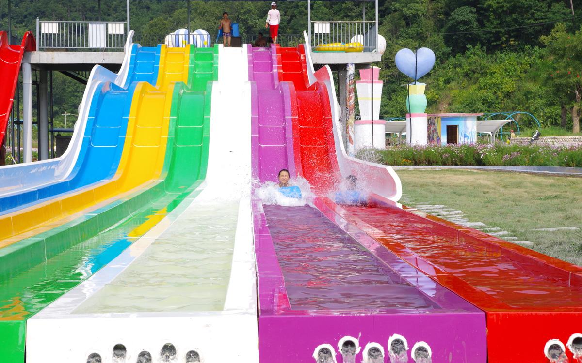 厂家直销水上乐园设备室内/外大型玻璃钢彩虹竞赛水上滑梯设施