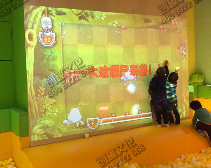 亲子互动淘气堡，室内游乐场商城亲子互动淘气堡、互动投影游戏“丛林战僵尸”