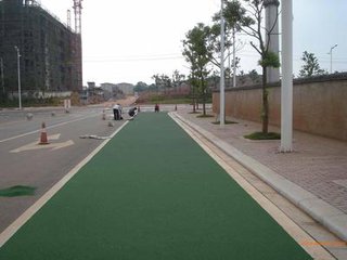 钦州市黑色沥青路面改色彩色路面喷涂修复