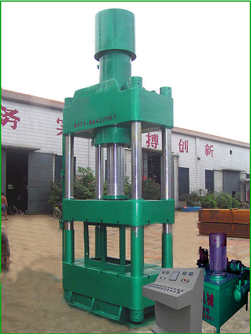 铁屑压块机采用液压传动结构紧凑